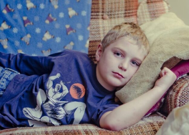 kid-on-a-couch-768×548